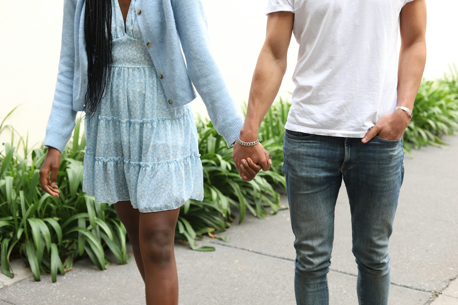 Illustrative lifestyle photograph of a couple walking; photo by Good Faces Agency on Unsplash