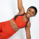 Illustrative lifestyle photograph of a woman exercising; photo by April Laugh on Unsplash